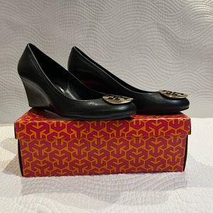 Tory Burch black leather Sally wedge shoes.